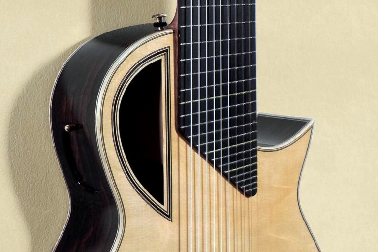 Sound Hole Size, Position and Shape Influence the Sound Stoll Guitars
