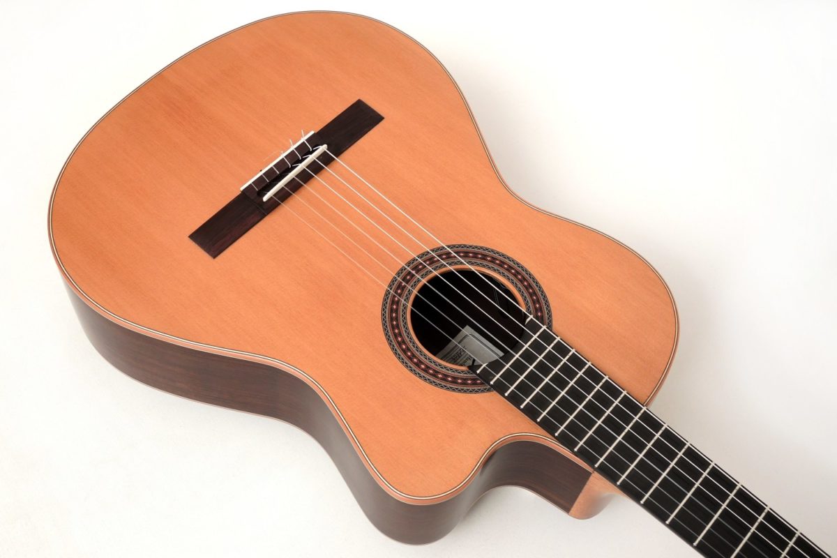 Small Classical Guitar with Cutaway and Pickup for Modern Playing Styles