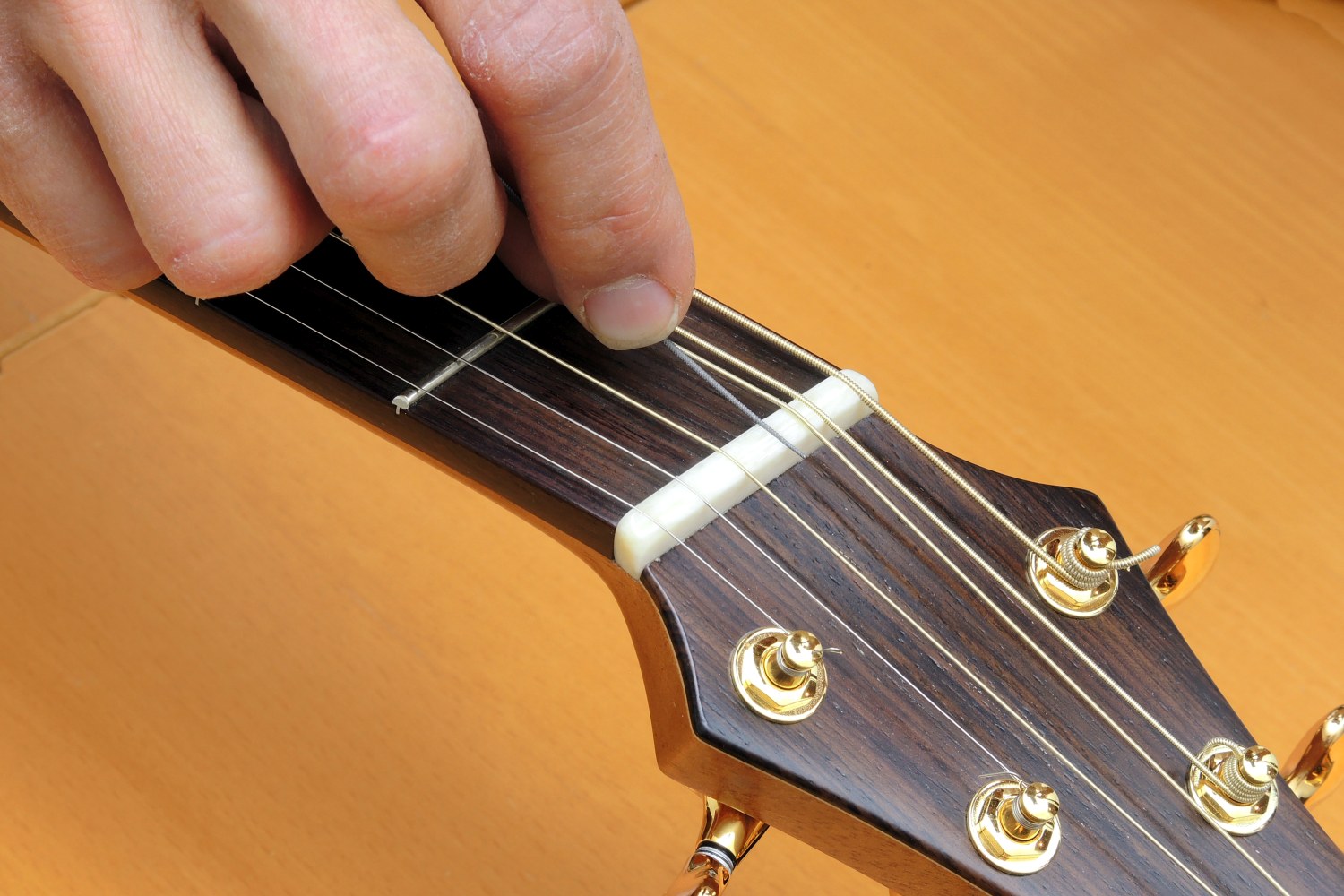 replacing nut acoustic guitar